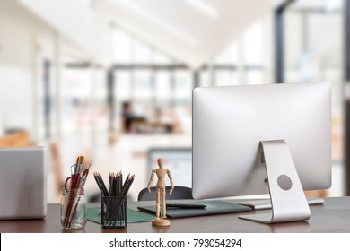 Stylish workspace with desktop computer, office supplies and laptop at office. desk work concept.