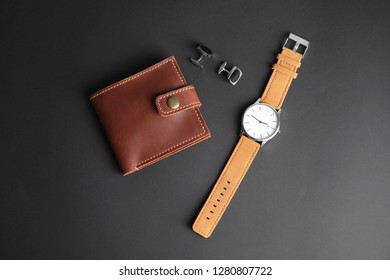 Stylish Wrist Watch, Cuff Links And Wallet On Black Background. Fashion Accessory