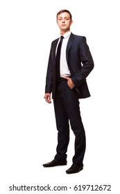 Stylish Young Man In Suit And Tie. Business Style. Handsome Man Standing And Looking At The Camera