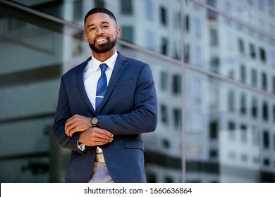 Stylish Young Modern Business Entrepreneur CEO, Corporate Executive In Suit And Tie In Urban Setting