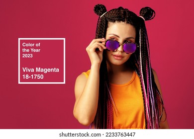 Stylish young woman with cornrows wearing purple sunglasses. Color of the year 2023, viva magenta. - Shutterstock ID 2233763447