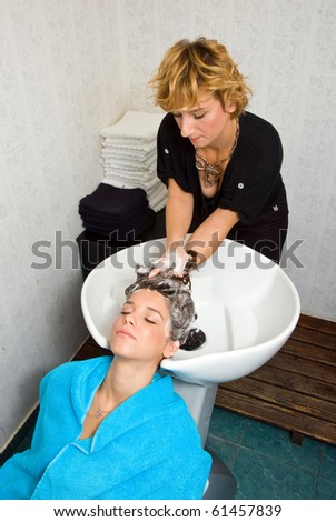 Image, Stock Photo Caregiver helping elderly female patient to get out of bed