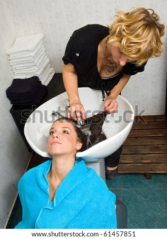 Similar – Image, Stock Photo Caregiver helping elderly female patient to get out of bed