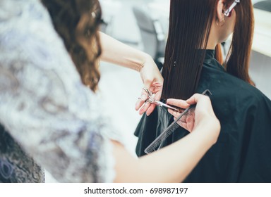 Stylist Working In The Beauty Salon, Haircut And Hair Styling