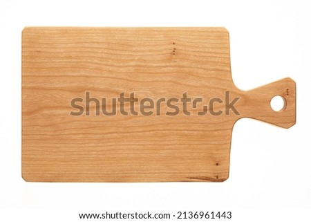 Stylized handmade cherry wood chopping board