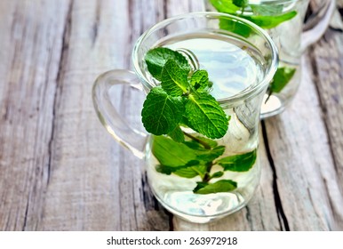 Stylized Photo Of Cups With Fresh Mint Tea