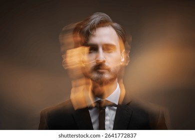 Stylized portrait of a man in a suit with artistic motion blur effect, creative dual exposure look on dark background.
