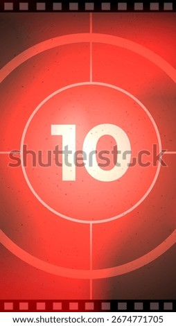 A stylized red countdown timer showing the number ten within a film reel frame. Vintage texture is present.