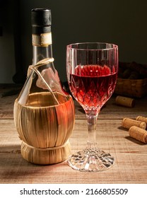 Stylized Wine Glass On Wooden Base