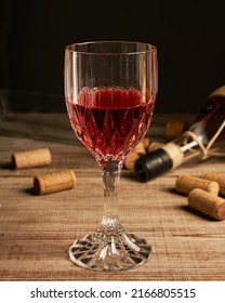 Stylized Wine Glass On Wooden Base