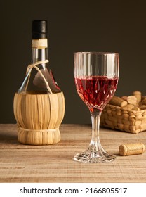 Stylized Wine Glass On Wooden Base