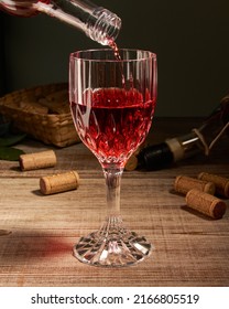 Stylized Wine Glass On Wooden Base