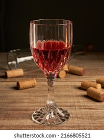 Stylized Wine Glass On Wooden Base