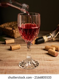 Stylized Wine Glass On Wooden Base