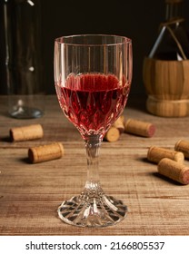 Stylized Wine Glass On Wooden Base