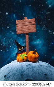 Stylized Wooden Signpost, Witch Hat And Pumpkins On The Moon. Mockup. Halloween Background. 