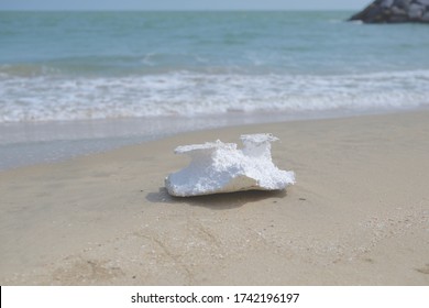 Styrofoam debris or garbage on the sand beach, marine debris pollution