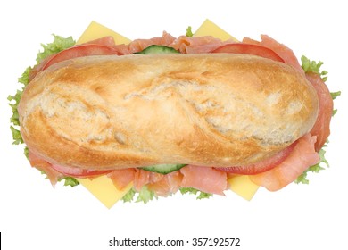 Sub Deli Sandwich Baguette With Salmon Fish, Cheese, Tomatoes And Lettuce Top View Isolated On A White Background