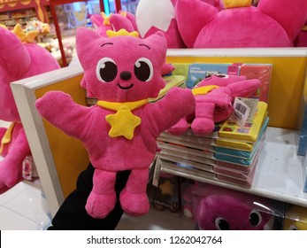 Subang Jaya, Malaysia - 15 December 2018 : Hand Hold A Doll Of Pinkfong For Sell In Hypermarket.