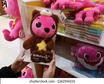 Subang Jaya, Malaysia - 15 December 2018 : Hand Hold A Bear Pinkfong - Plush Toy For Sell In The Hypermarket.