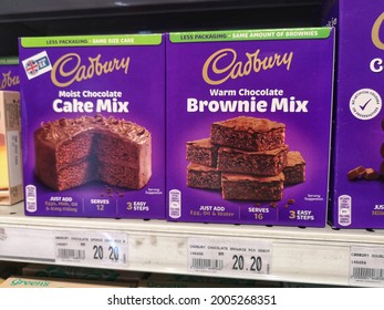 Subang Jaya, Malaysia - 18 June 2021 : Boxed Of CADBURY Cake Mix And Brownie Mix Display For Sell On The Supermarket Shelf With Selective Focus.