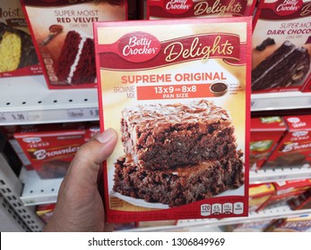 Subang Jaya, Malaysia - 2 February 2019 : Hand Hold A Box Of BETTY CROCKER Supreme Original Brownie Mix Flour For Sell In The Supermarket