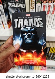 Subang Jaya, Malaysia - 22 June 2019 : Hand Hold A MARVEL Thanos Book For Sell In The Book Stores With Selective Focus.  