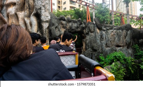 Subang Jaya, Malaysia - November 28, 2019: Tourist Riding A Rollercoaster At Sunway Lagoon Theme Park In Bandar Sunway. The View From The Seat Inside The Rollercoaster. Outdoor Activities.