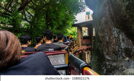 Subang Jaya, Malaysia - November 28, 2019: Tourist Riding A Rollercoaster At Sunway Lagoon Theme Park In Bandar Sunway. The View From The Seat Inside The Rollercoaster. Outdoor Activities.