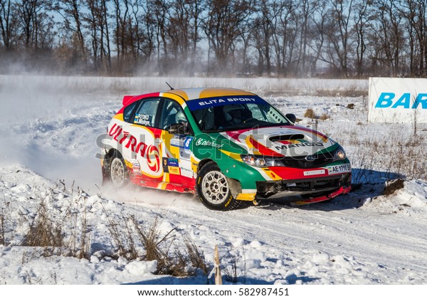 Subaru Rally driver\
takes part in rally Zaviriukha in the city Dnipro in Ukraine in\
21-22 of January 2017\
year