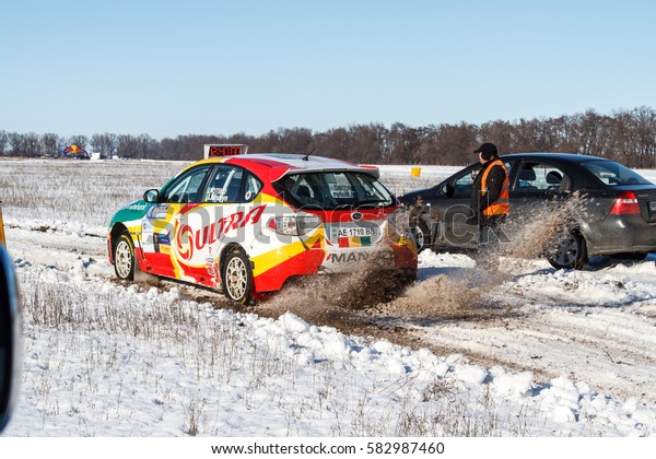 Subaru Rally driver\
takes part in rally Zaviriukha in the city Dnipro in Ukraine in\
21-22 of January 2017\
year