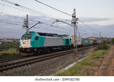 Subirats (Barcelona, Spain). 04-29-2015.  Freight Train Crossing The Vineyards Of Penedès