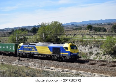 Subirats (Barcelona, Spain). 04-29-2015.  Freight Train Crossing The Vineyards Of Penedès