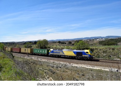 Subirats (Barcelona, Spain). 04-29-2015.  Freight Train Crossing The Vineyards Of Penedès