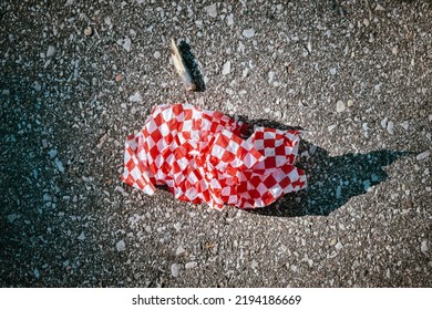 The Subject Is A Piece Of Fast Food Wrapper Which Was On Pitch Instead Of In Garbage Can. The Picture Was Clicked In June 10, 2022 In Winnipeg.