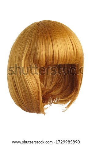 Subject shot of a golden yellow wig with bangs. The short blunt bob wig is isolated on the white background. 