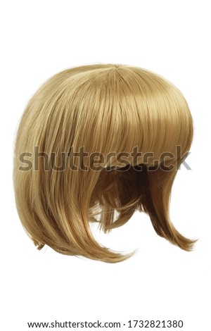 Subject shot of a natural looking light blonde wig with bangs. The short blunt bob wig is isolated on the white background. 