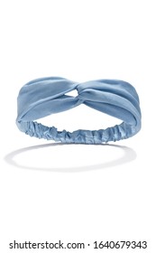 Subject Shot Of A Wide Fabric Headband Made As Crossed Blue Denim Bands. The Hair Holder Is Isolated On The White Background With Shadows.