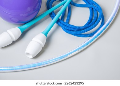 Subjects for practicing rhythmic gymnastics. Hoop, ball, clubs, rope. Selective focus. - Powered by Shutterstock