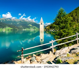 Submerged Bell Tower Of Curon On Lake Reschen In South Tyrol, Italy