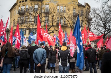 SUBOTICA, SERBIA - MARCH 27, 2016: Supporters Of Serbian Socialist Part Cheering  Waiving Their Red Flags In A Political Meeting. Called SPS Or Socijalisticka Partija Srbije, It Is A Left Wing Party