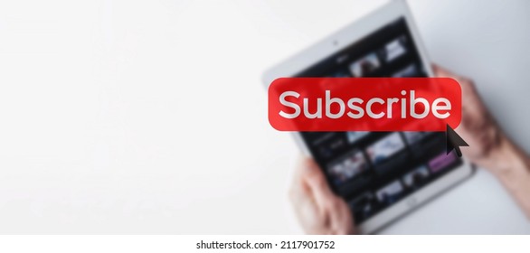 Subscribe banner. Online video subscription red button. Internet service on laptop digital tablet blured technology background. Social media concept. Streaming video - Powered by Shutterstock