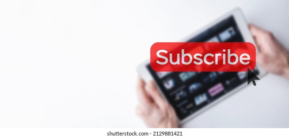 Subscribe banner. Online video subscription red button. Internet service on laptop digital tablet blured technology background. Social media concept. Streaming video