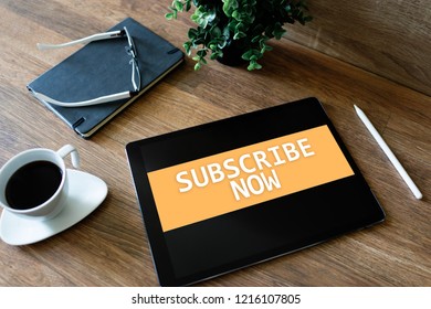 Subscribe button on device screen. Internet and digital marketing concept