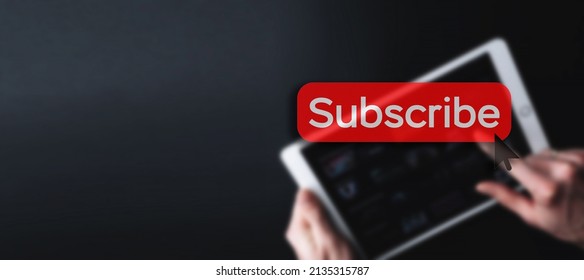 Subscribe button. Online video subscription red button. Internet service on laptop digital tablet blured banner background. Visual contents concept. Social networking service