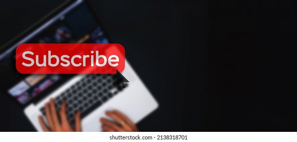 Subscribe button. Online video subscription red button. Internet service on laptop digital tablet blured banner background. Visual contents concept. Social networking service