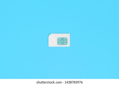 Subscriber Identity Module. White SIM Card On Blue Background