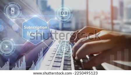 Subscription business model concepts.Close-up of man hands using laptop or computer
