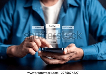 Subscription plan management and comparison concept. Person using smartphone with pricing tier option.