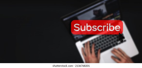 Subscription service. Online video red subscribe button. Internet service on laptop digital tablet blured banner background. Streaming video. Communication network